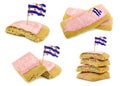 Traditional Dutch and Frisian pink glazed pastry called `fondant koek` with a frisian flag toothpick