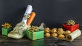 Traditional Dutch holiday Sinterklaas for children in Europe, Netherlands, Belgium. child boot shoe with letter, carrot, gift,