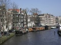 Traditional Dutch Houses and docked Houseboats