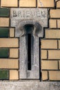 Traditional Dutch mail box whole integrated on walls or doors Royalty Free Stock Photo