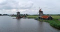 Traditional Dutch old wooden windmill in Zaanse Schans - museum Royalty Free Stock Photo