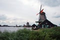 Traditional Dutch old wooden windmill in Zaanse Schans - museum Royalty Free Stock Photo