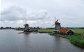 Traditional Dutch old wooden windmill in Zaanse Schans - museum Royalty Free Stock Photo