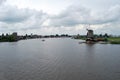 Traditional Dutch old wooden windmill in Zaanse Schans - museum Royalty Free Stock Photo