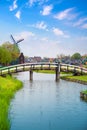 Traditional Dutch old wooden windmill in Zaanse Schans Royalty Free Stock Photo