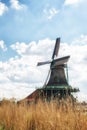 Traditional Dutch old wooden Windmills in Zaanse Schans - museum Royalty Free Stock Photo