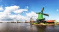 Traditional Dutch old wooden Windmills in Zaanse Schans - museum Royalty Free Stock Photo