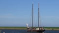 Traditional Dutch sailing ship leaving harbor Royalty Free Stock Photo