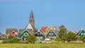 Traditional dutch Village with with colorful houses and church Royalty Free Stock Photo