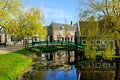 Traditional Dutch village of Zaanse Schans, with historic houses and bridge over a canal, Netherlands