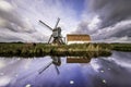 Traditional Dutch windmill with the barn Royalty Free Stock Photo