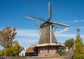 Historical dutch windmill from 1818 in the village of Dalfsen, Province Overijssel, on a sunny autumn day Royalty Free Stock Photo