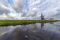 Traditional Dutch windmill with its barn Royalty Free Stock Photo