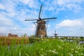 Traditional Dutch windmill in Kinderdijk near Rotterdam Royalty Free Stock Photo