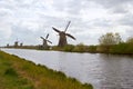 Traditional dutch windmill near the canal. Netherlands Royalty Free Stock Photo