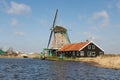 Traditional Dutch windmill near the river, the Netherlands Royalty Free Stock Photo