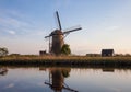 Traditional dutch windmill in village Kinderdijk, Holland Royalty Free Stock Photo