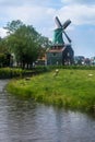 traditional Dutch Windmills and cottages in Zaanse Schans, Netherland