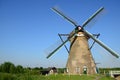 Traditional dutch windmills in the famous place of Kinderdijk, UNESCO world heritage site. Netherlands. Royalty Free Stock Photo