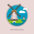 Traditional Dutch windmills with landscape and clouds.