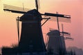 Traditional Dutch windmills at sunrise Royalty Free Stock Photo