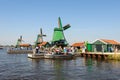 Traditional Dutch windmills in Zaanse Schans, Netherlands Royalty Free Stock Photo