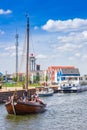 Traditional dutch wooden sailing ship taking tourists for a ride in Harderwijk Royalty Free Stock Photo
