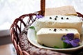 Traditional easter basket with easter cake, cheese, eggs