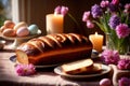 Traditional easter bread on table with flowers, traditional springtime festive holiday celebration decoration