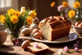 Traditional easter bread on table with flowers, traditional springtime festive holiday celebration decoration