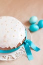 Traditional Easter cake and blue colored eggs on the craft paper Royalty Free Stock Photo