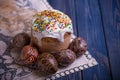 Traditional easter cake kulich Ukrainian Russian with colored eggs Royalty Free Stock Photo