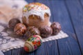 Traditional easter cake kulich Ukrainian Russian with colored eggs Royalty Free Stock Photo