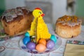Traditional easter cake kulich Ukrainian Russian style with colored eggs on table Royalty Free Stock Photo