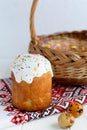 Traditional easter cake kulich Ukrainian style with colored eggs on painted towel Royalty Free Stock Photo