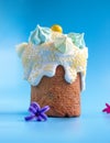 Traditional Easter cakes on blue background. Traditional Kulich, Paska Easter Bread. Postcard