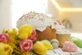 Traditional Easter cakes, flowers and dyed eggs on table, closeup Royalty Free Stock Photo