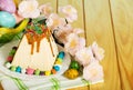 Traditional Easter cheesecake dessert, Easter eggs, flowers and