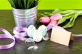 Traditional easter egg decoration with tulips and ribbo Royalty Free Stock Photo