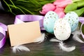 Traditional easter egg decoration with tulips and ribbo Royalty Free Stock Photo