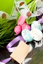 Traditional easter egg decoration with tulips and ribbo Royalty Free Stock Photo