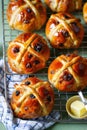 Traditional easter food Hot Cross Buns on baking tray, top view