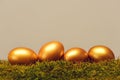 Traditional easter golden eggs on wooden background Royalty Free Stock Photo