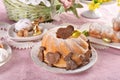 Traditional Easter ring cake with cocoa cookies in bunny and chicken shape