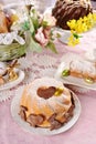 Traditional Easter ring cake with cocoa cookies in bunny and chicken shape