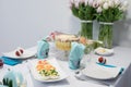 The traditional easter table with the tulips Royalty Free Stock Photo