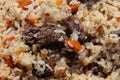 Traditional Eastern culinary dish - pilaf. Close-up view of Asian tasty food background