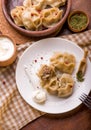 traditional Eastern dish manti or manty with beef in a dark Royalty Free Stock Photo