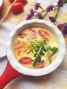 Traditional egg frittata with tomatoes and cheese in the oven Dish  Top View. Baked omelet with vegetables and cheese Royalty Free Stock Photo
