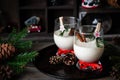 Traditional eggnog Christmas cocktail in a glass goblet decorated with New Year clothespin. Non-alcoholic option Royalty Free Stock Photo